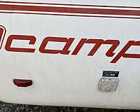 scamp-rv-with-slide-cover