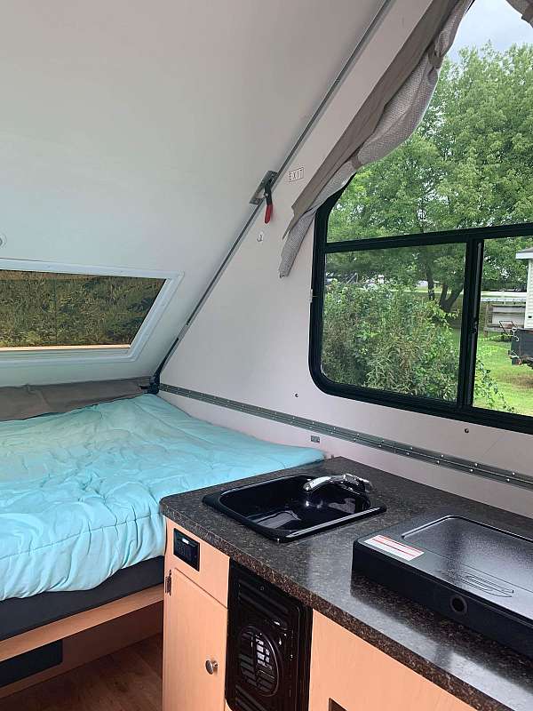 rv-with-leveling-jack-in-hillsboro-nh