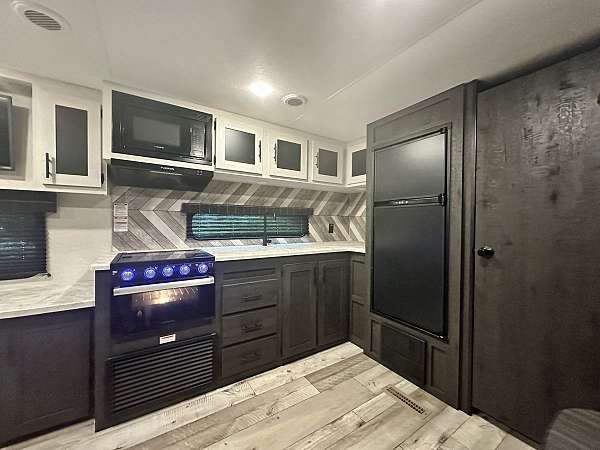 kz-sportsmen-rv-with-water-heater
